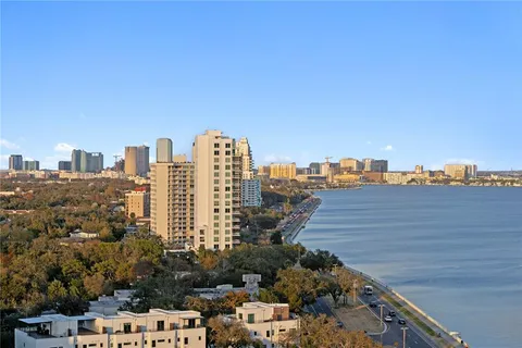 a view of a city with tall buildings