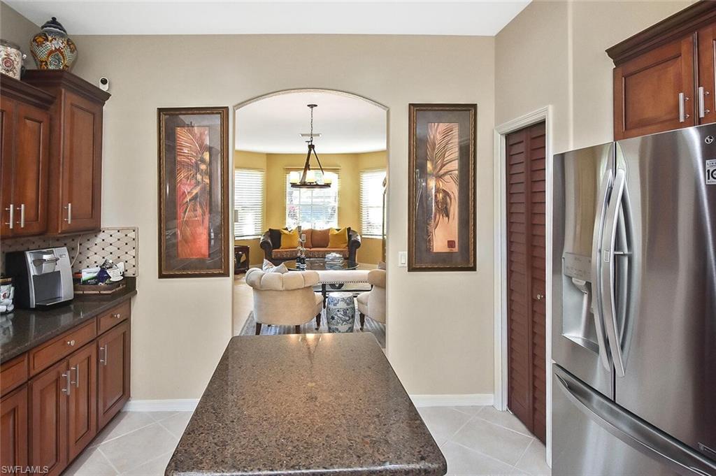 12421 Rock Ridge Lane Fort Myers, FL 33913 - Photo 13 of 50 a very nice looking dining room with a couch and a window