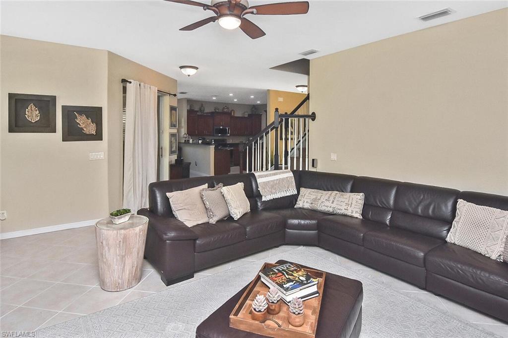 12421 Rock Ridge Lane Fort Myers, FL 33913 - Photo 17 of 50 a living room with furniture and a wooden floor