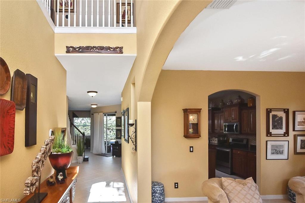 12421 Rock Ridge Lane Fort Myers, FL 33913 - Photo 22 of 50 a living room with furniture and wooden floor