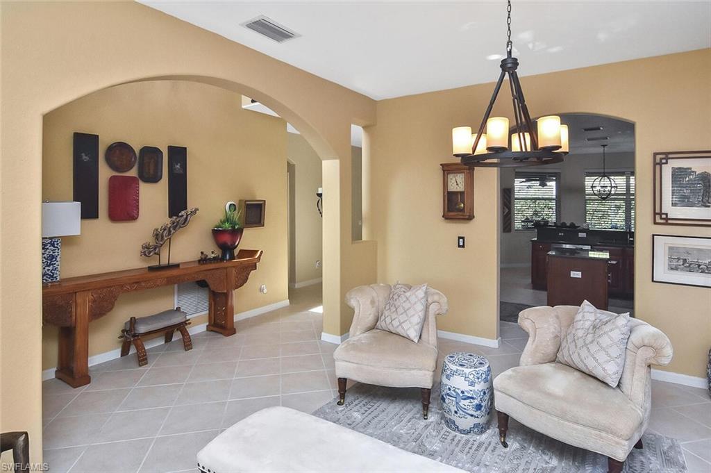 12421 Rock Ridge Lane Fort Myers, FL 33913 - Photo 23 of 50 a living room with furniture and wooden floor
