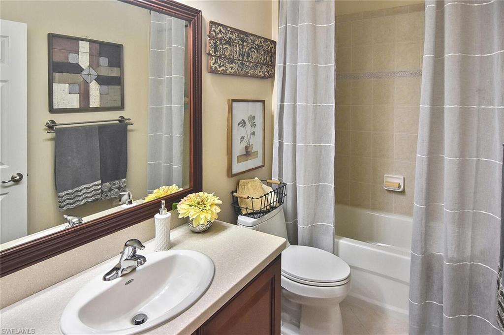 12421 Rock Ridge Lane Fort Myers, FL 33913 - Photo 28 of 50 a bathroom with a sink toilet and shower