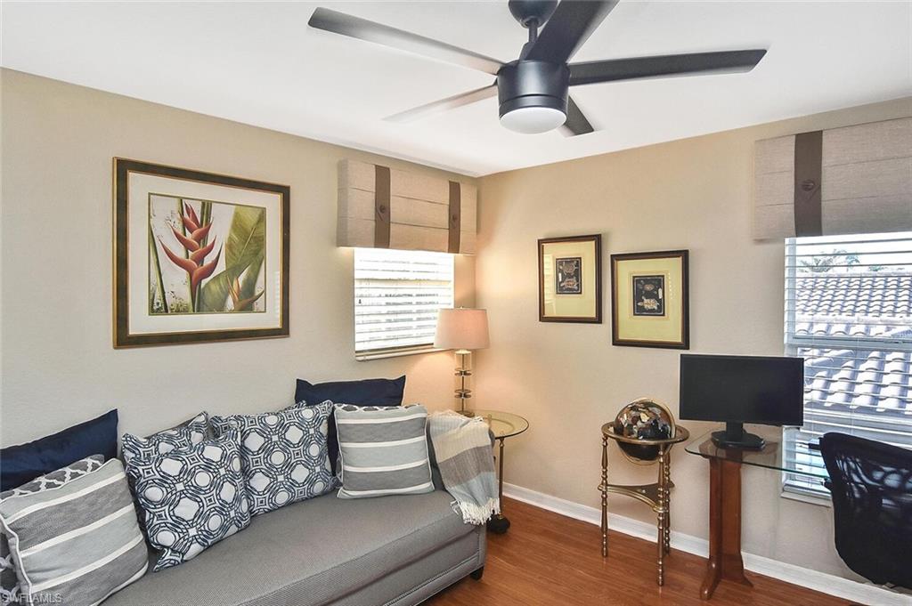 12421 Rock Ridge Lane Fort Myers, FL 33913 - Photo 32 of 50 a living room with furniture a couch and a computer on a desk