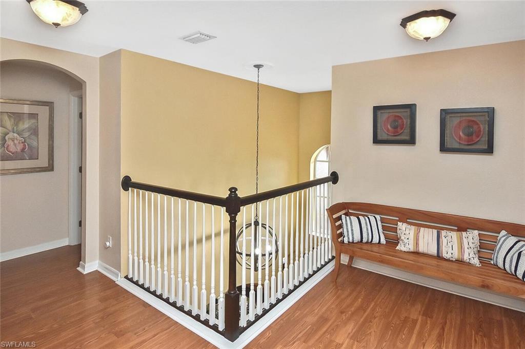 12421 Rock Ridge Lane Fort Myers, FL 33913 - Photo 34 of 50 a view of hallway with wooden floor