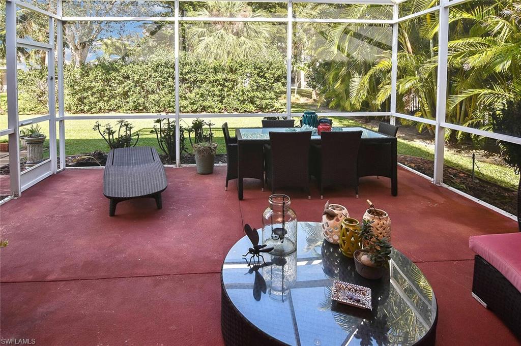 12421 Rock Ridge Lane Fort Myers, FL 33913 - Photo 37 of 50 a living room with a couch and a table