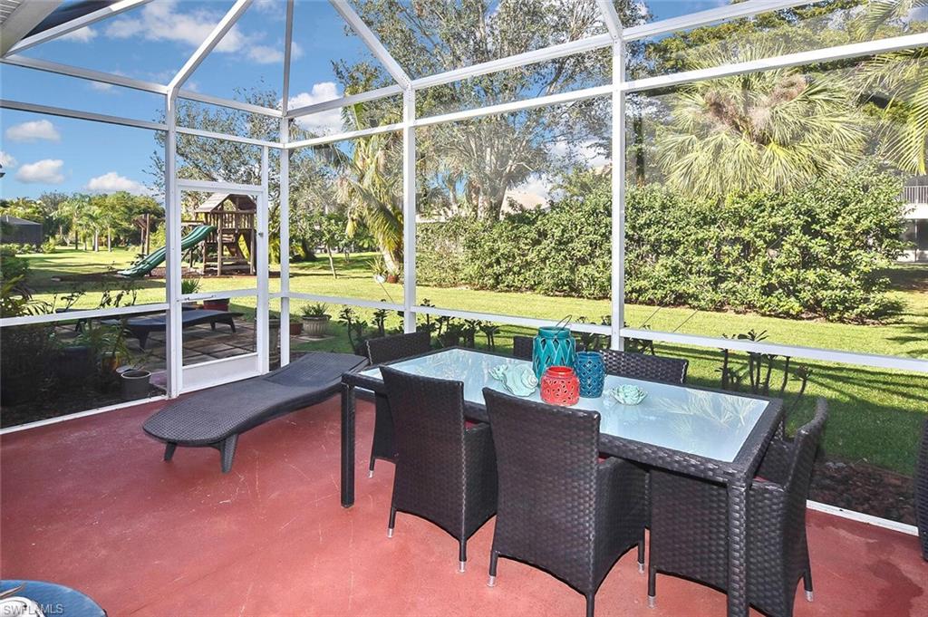 12421 Rock Ridge Lane Fort Myers, FL 33913 - Photo 38 of 50 a view of an outdoor sitting area with swimming pool