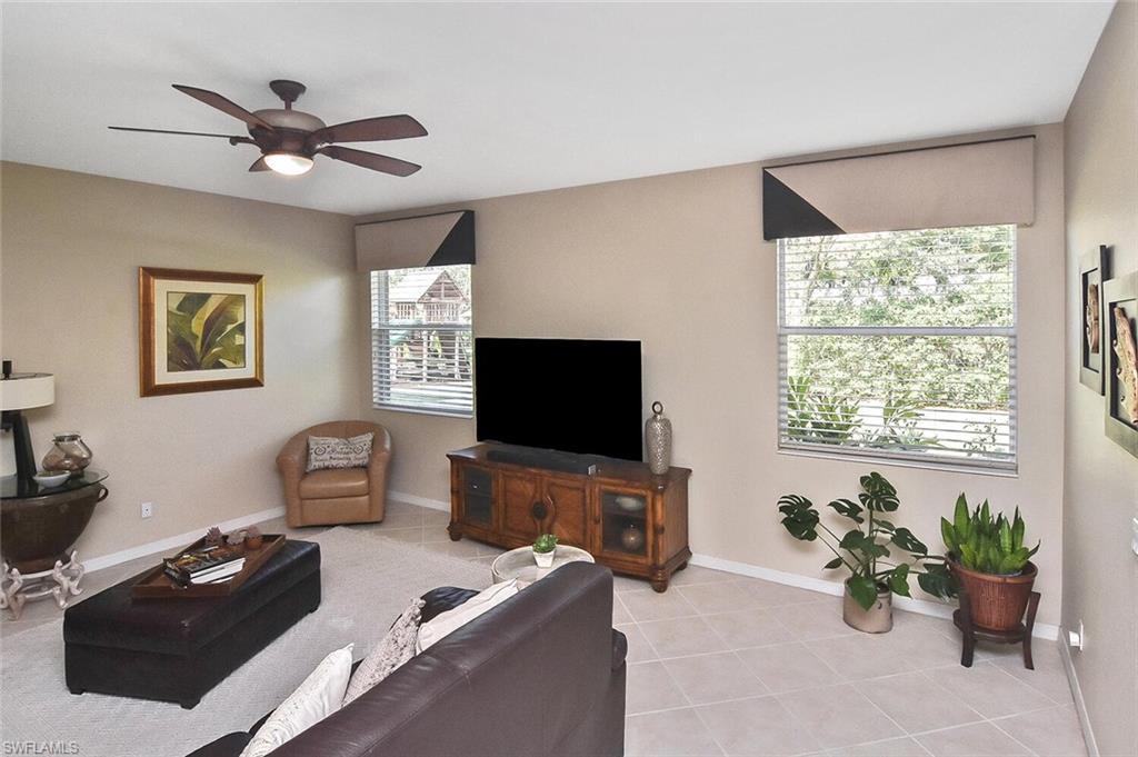 12421 Rock Ridge Lane Fort Myers, FL 33913 - Photo 4 of 50 a living room with furniture and a flat screen tv
