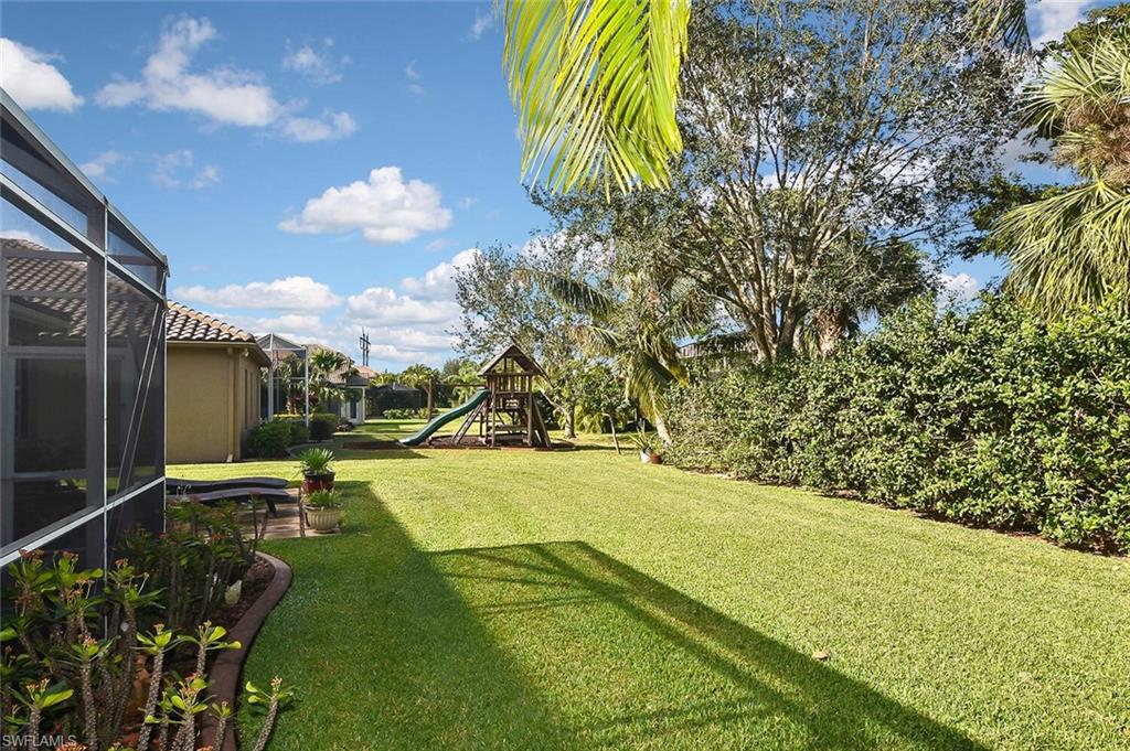 12421 Rock Ridge Lane Fort Myers, FL 33913 - Photo 41 of 50 a view of an outdoor space and basketball court