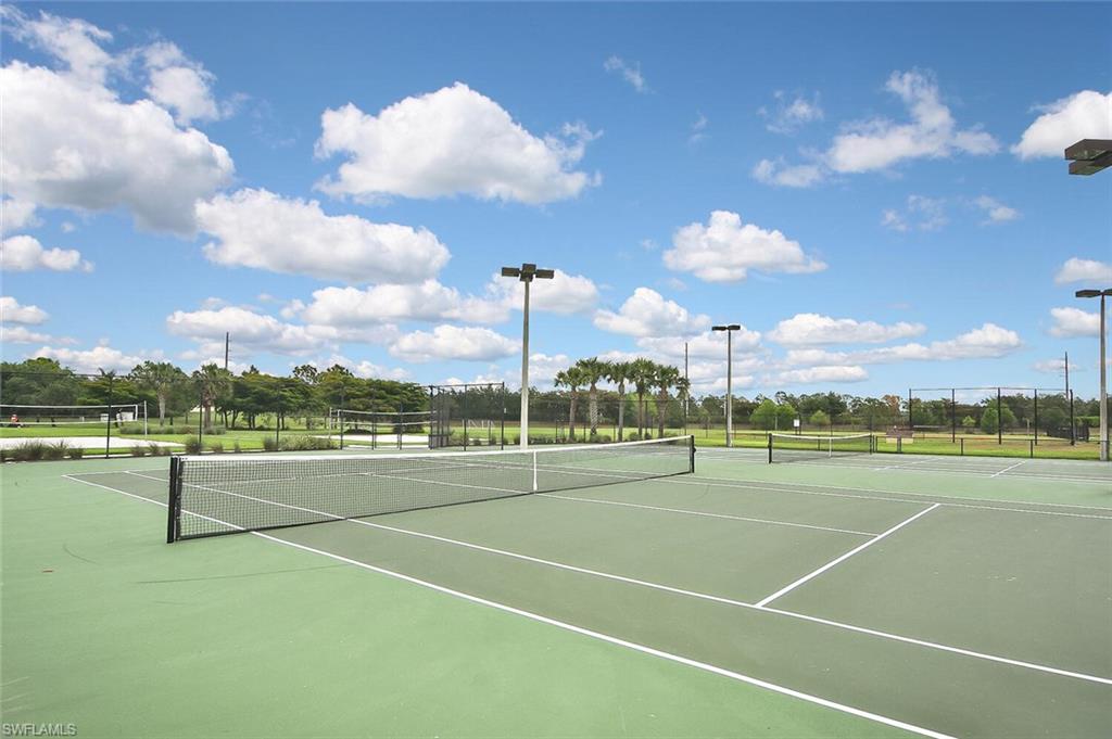 12421 Rock Ridge Lane Fort Myers, FL 33913 - Photo 45 of 50 a view of a tennis court