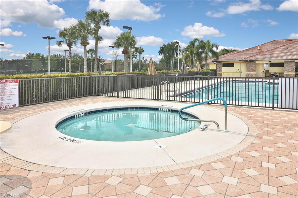 12421 Rock Ridge Lane Fort Myers, FL 33913 - Photo 47 of 50 a view of a swimming pool and deck