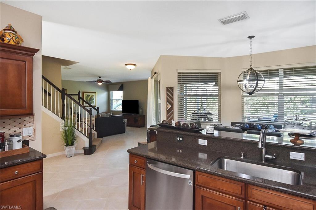 12421 Rock Ridge Lane Fort Myers, FL 33913 - Photo 10 of 50 a kitchen with a sink and a window