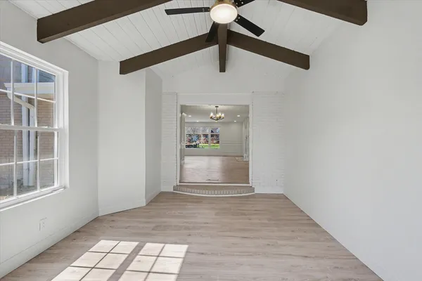 a view of an empty room and window