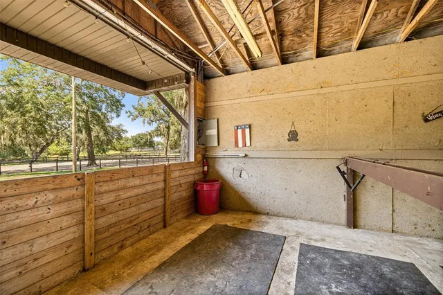 a view of grassy field with benches