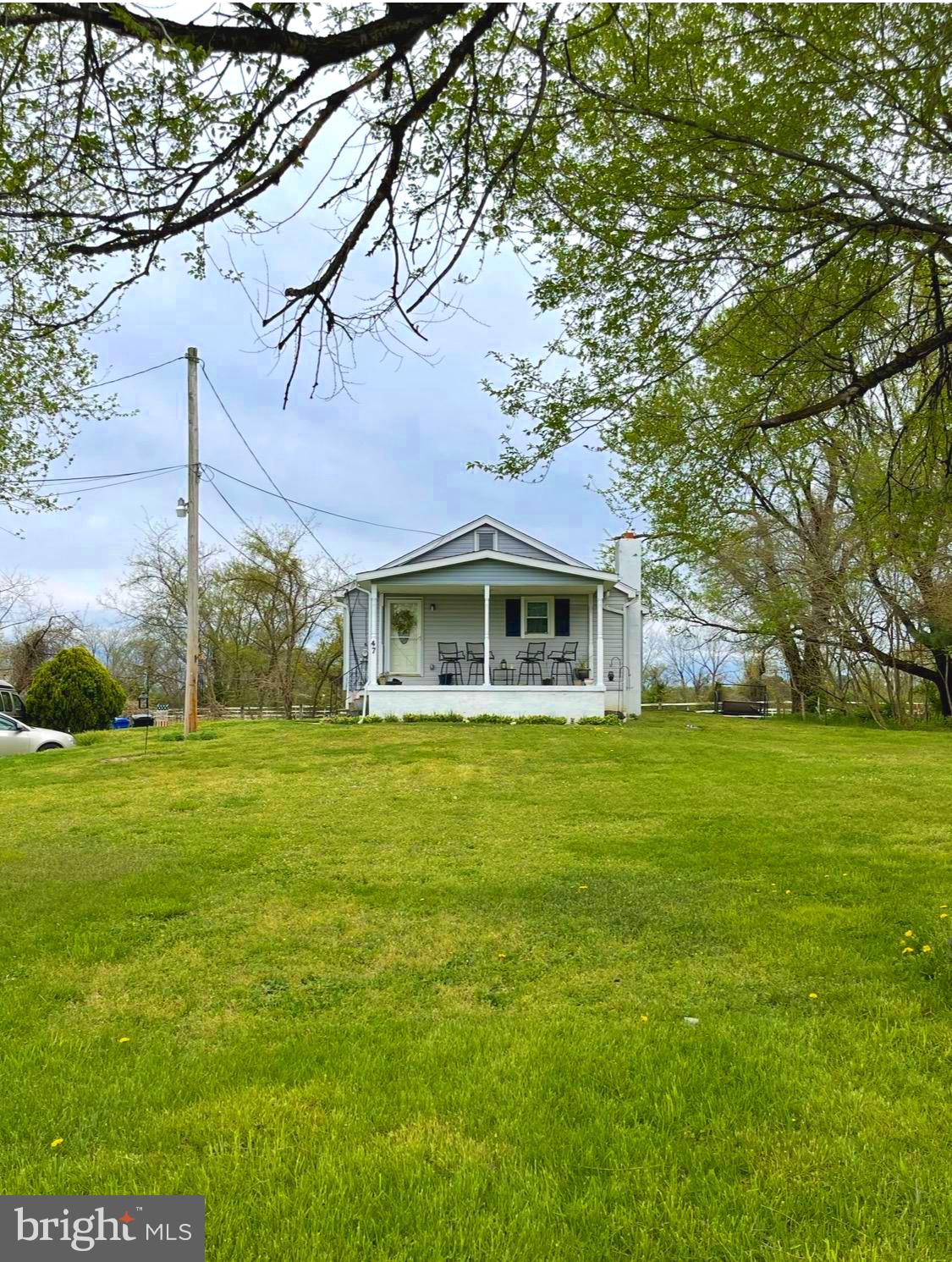 47 East Mill Street Pedricktown, NJ 08067 - Photo 2 of 8 a front view of a house with a garden