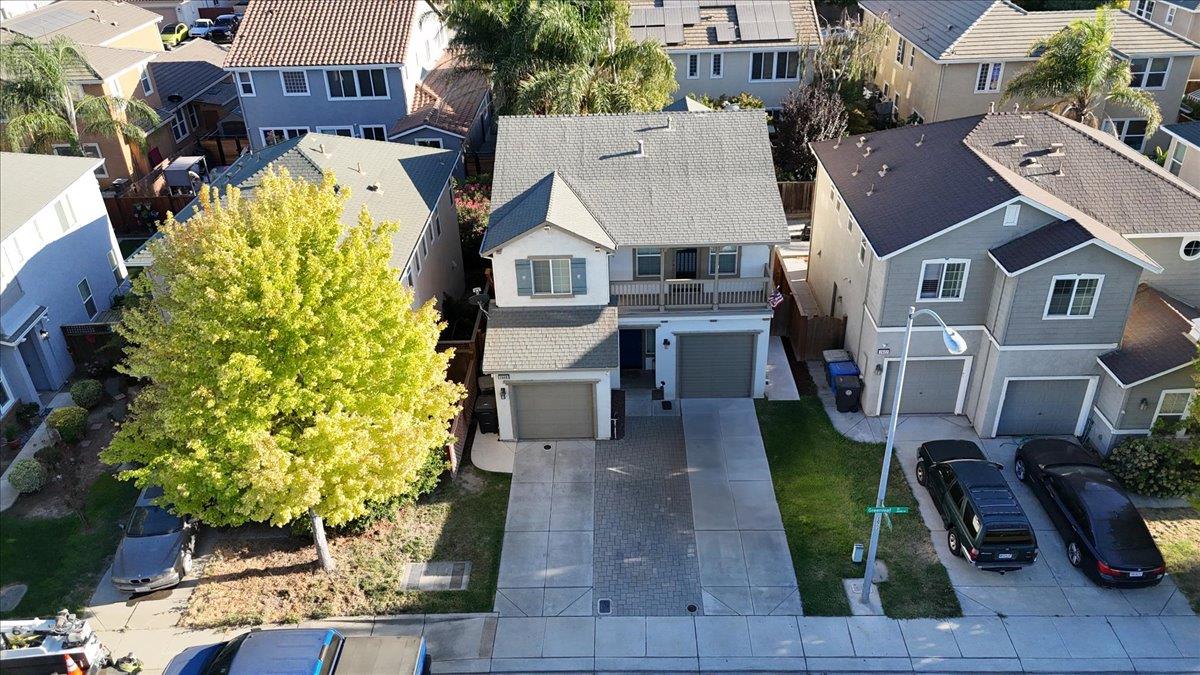 2608 Greenleaf Street Manteca, CA 95337 - Photo 3 of 65 an aerial view of residential houses with outdoor space