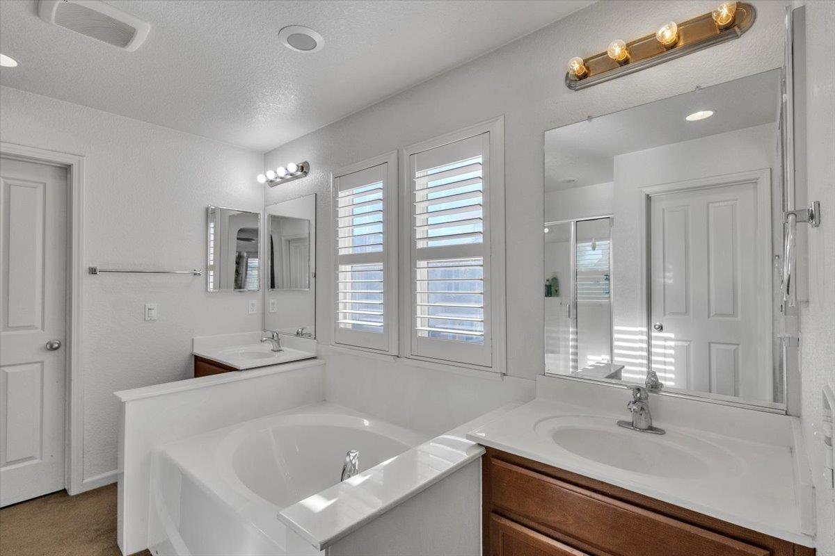 2608 Greenleaf Street Manteca, CA 95337 - Photo 34 of 65 a bathroom with a sink and a bathtub
