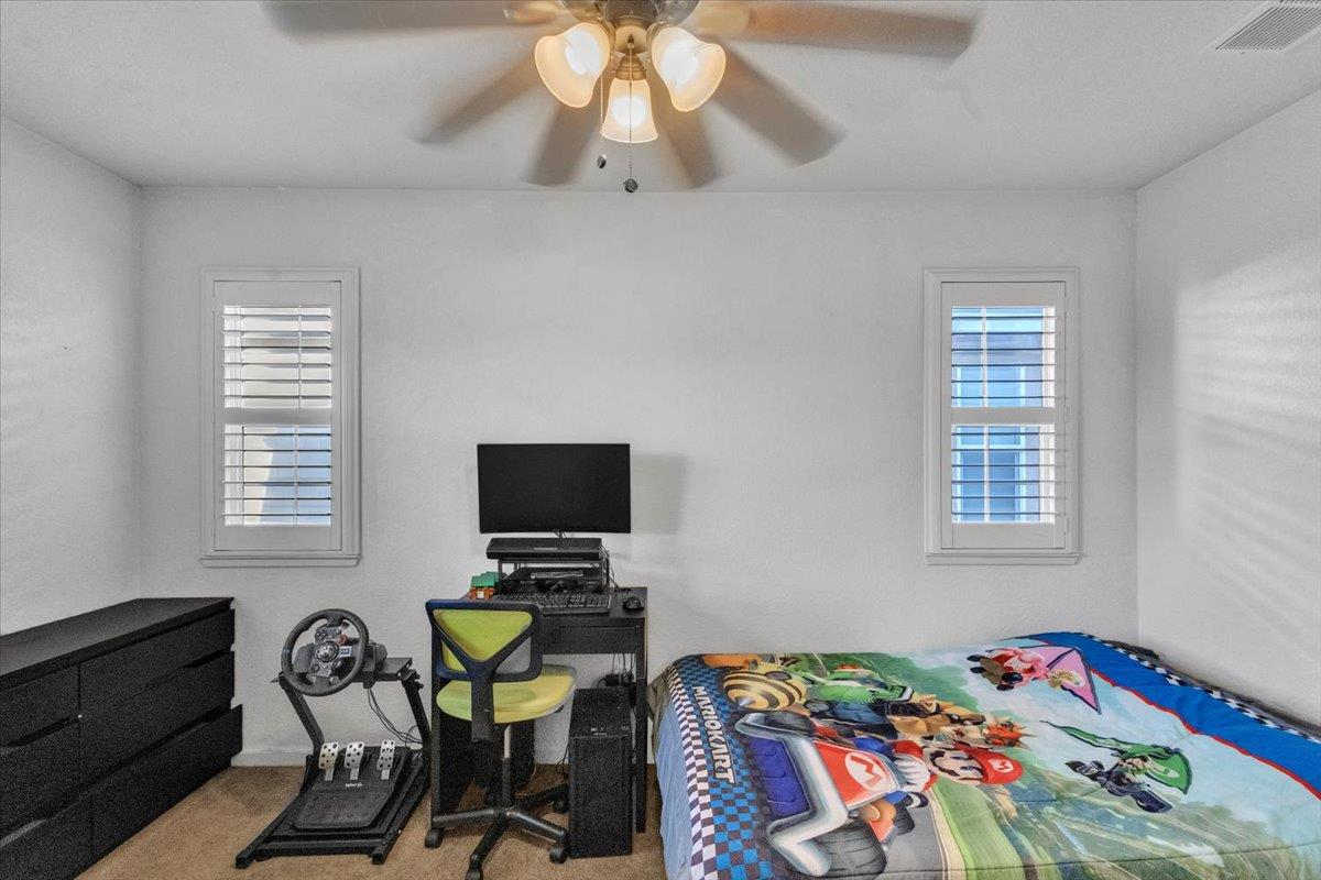 2608 Greenleaf Street Manteca, CA 95337 - Photo 44 of 65 a view of a workspace with furniture and a window