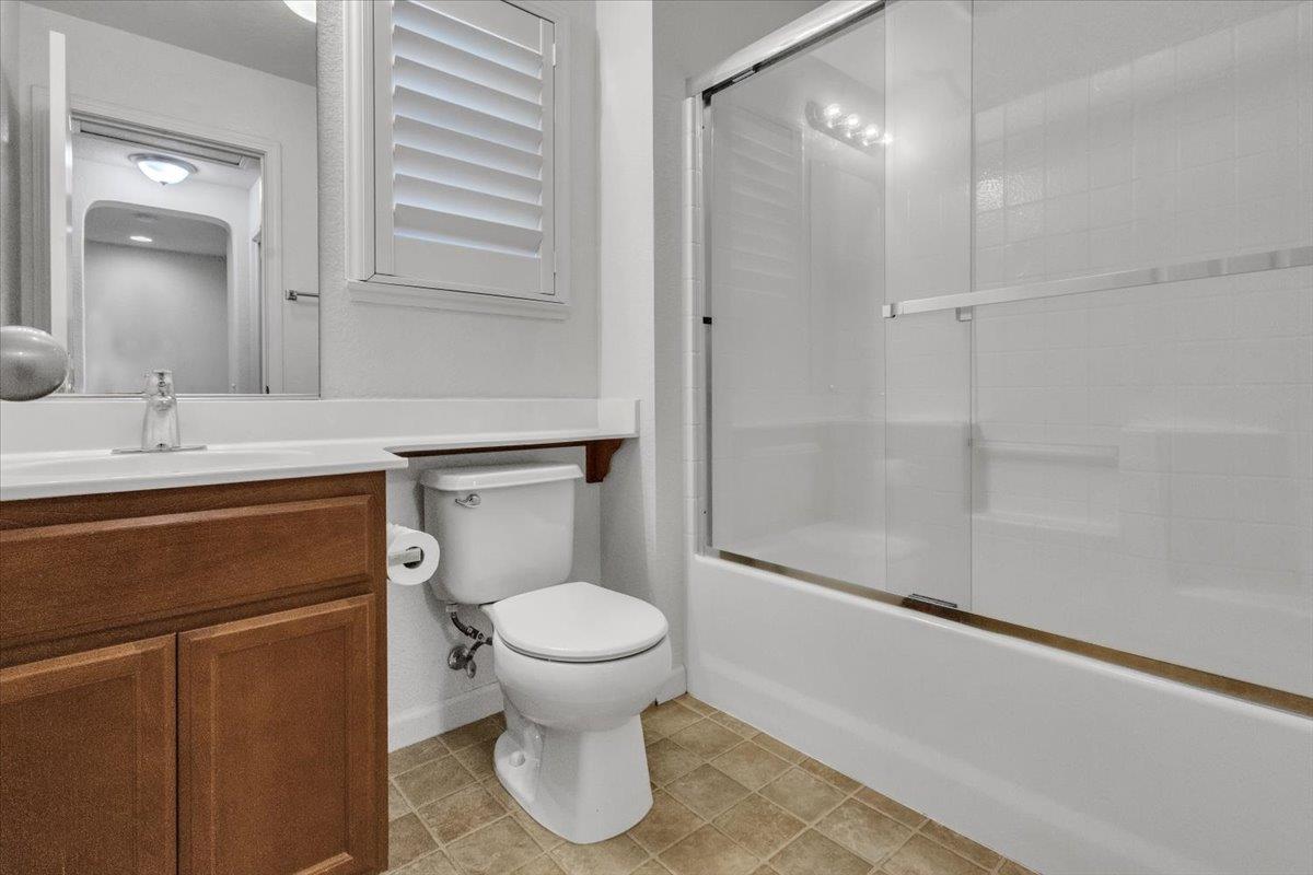 2608 Greenleaf Street Manteca, CA 95337 - Photo 48 of 65 a bathroom with a sink toilet and shower