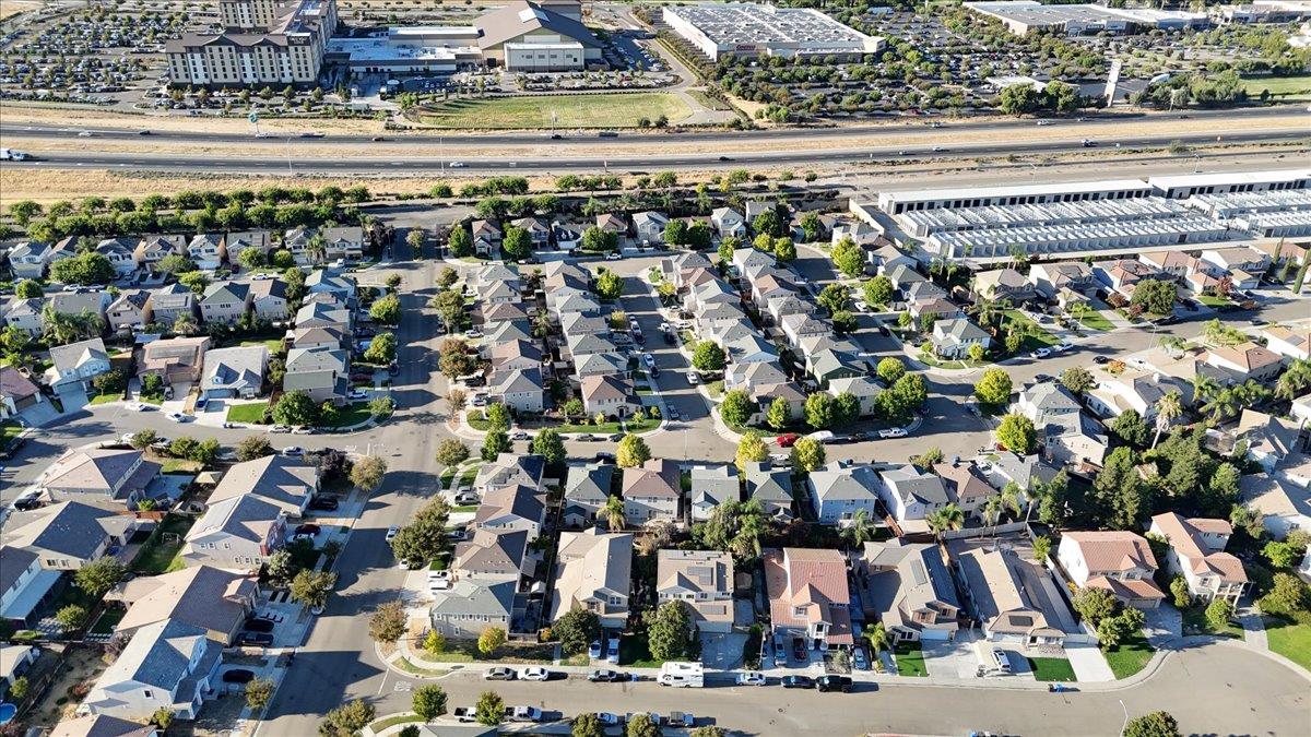 2608 Greenleaf Street Manteca, CA 95337 - Photo 53 of 65 an aerial view of a building with streets and trees