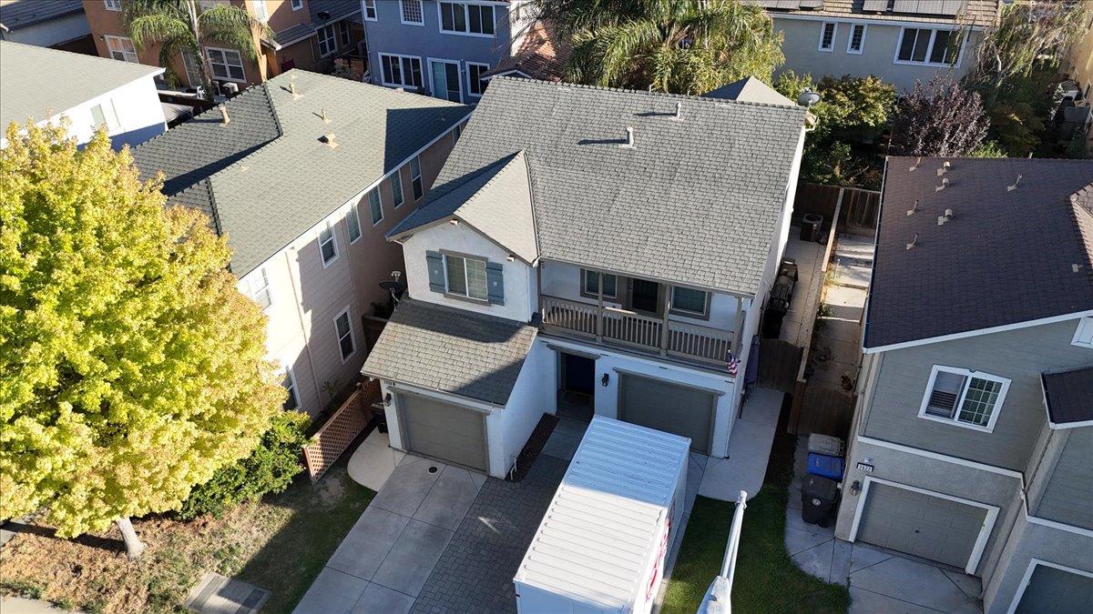 2608 Greenleaf Street Manteca, CA 95337 - Photo 59 of 65 an aerial view of residential houses with outdoor space