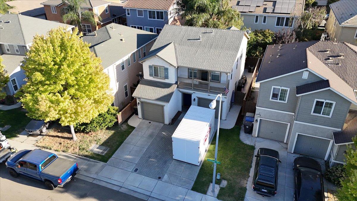 2608 Greenleaf Street Manteca, CA 95337 - Photo 60 of 65 an aerial view of a residential apartment building with a yard