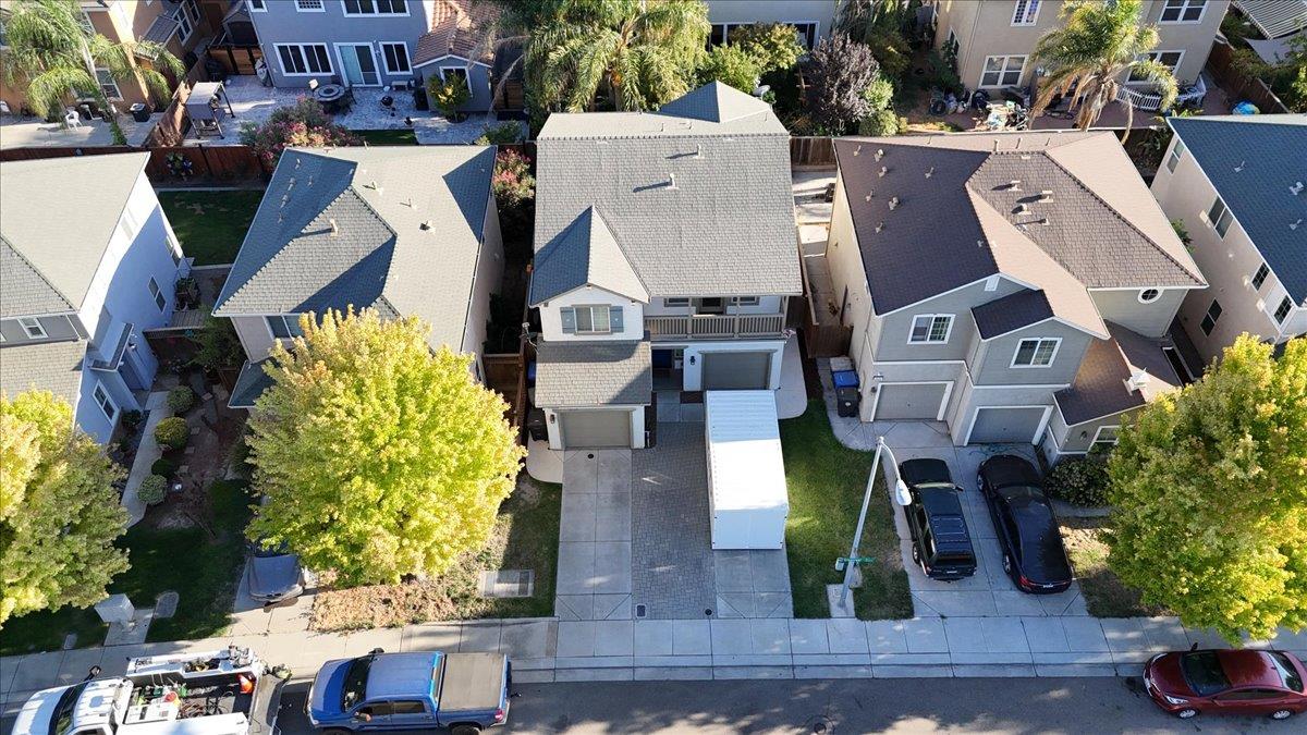 2608 Greenleaf Street Manteca, CA 95337 - Photo 62 of 65 an aerial view of residential houses with outdoor space
