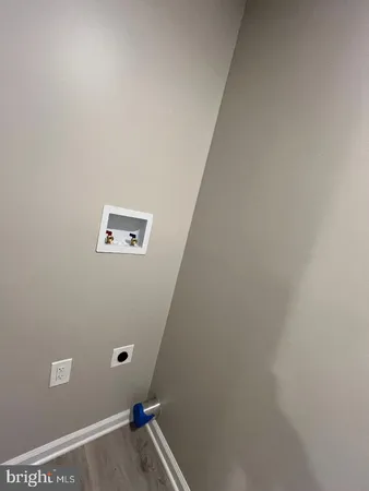 a view of a room with rack on the wall