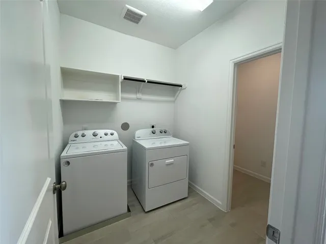 a view of utility room with washer and dryer