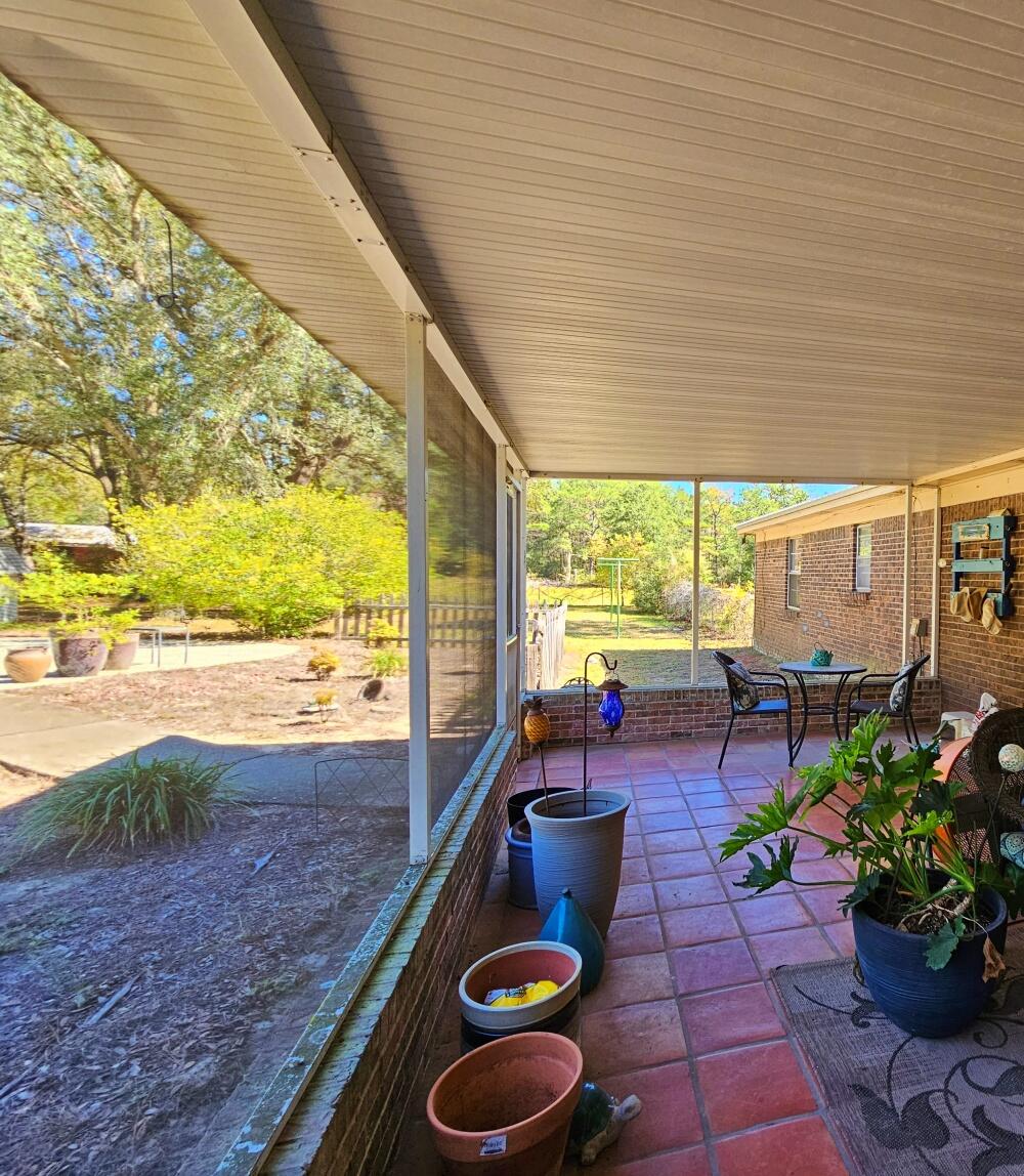 4017 Bear Creek Road Crestview, FL 32539 - Photo 18 of 30 a building outdoor space with patio furniture