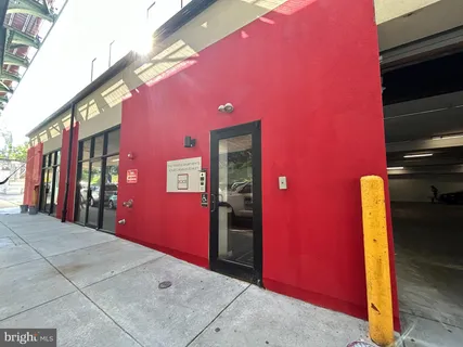 a front view of a building with many windows