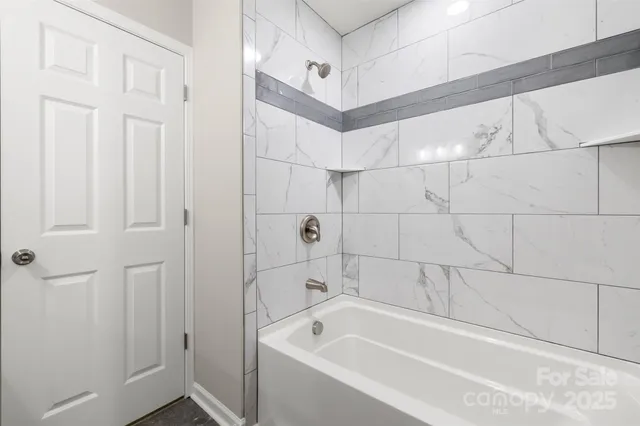 a bathroom with a bathtub