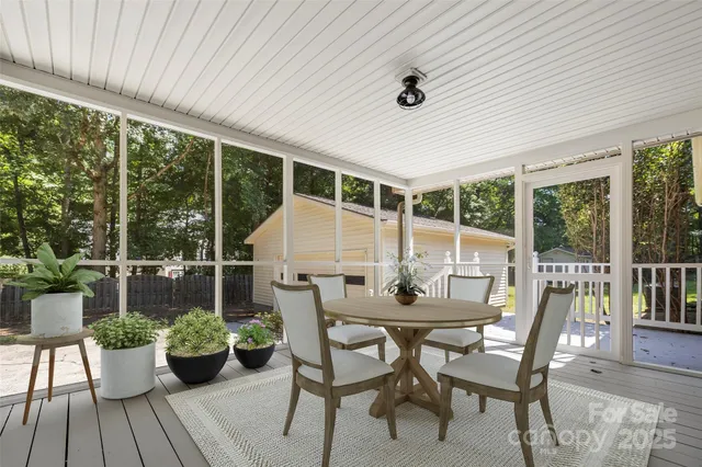 a view of a patio with furniture