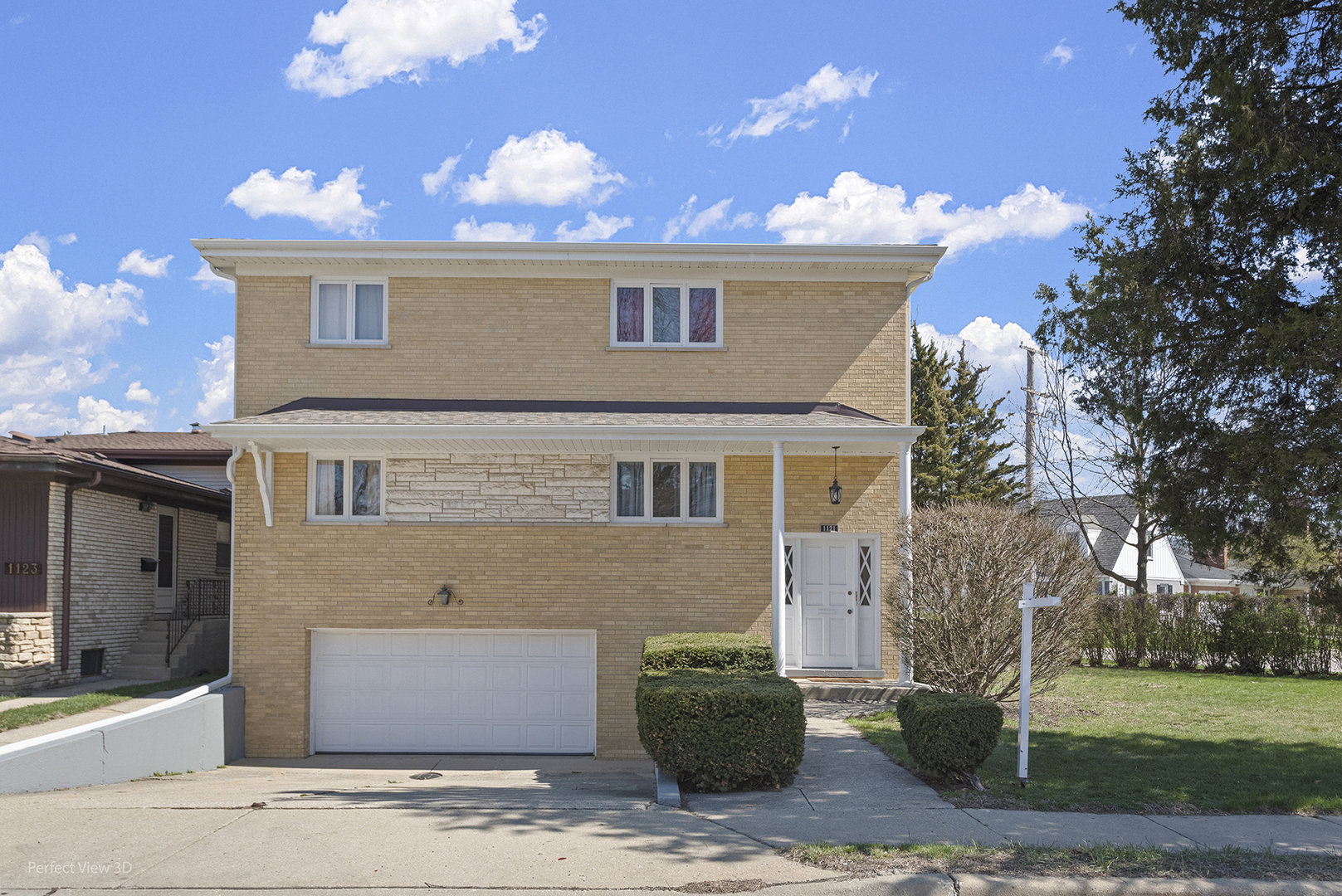 1121 North Northwest Highway Park Ridge, IL 60068 - Photo 1 of 26 a front view of a house with a yard