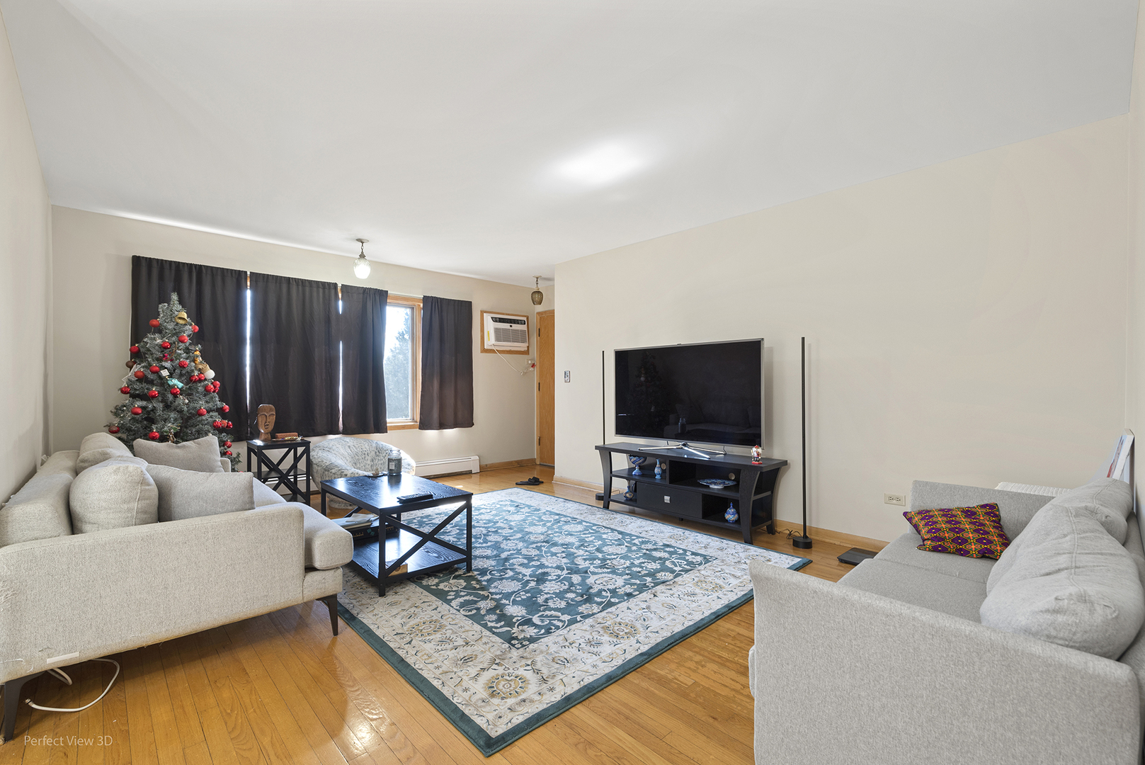 1121 North Northwest Highway Park Ridge, IL 60068 - Photo 18 of 26 a living room with furniture and a flat screen tv