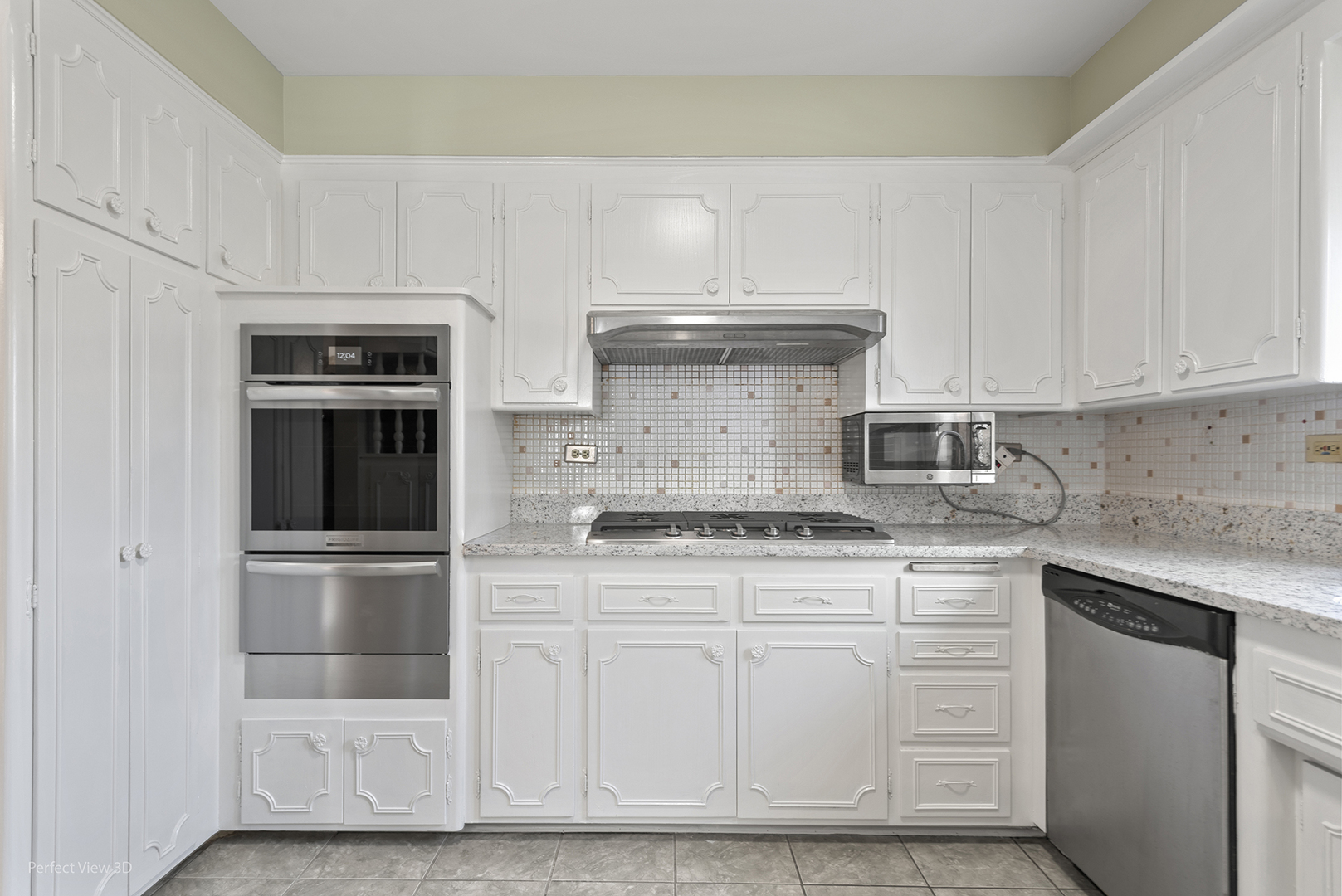 1121 North Northwest Highway Park Ridge, IL 60068 - Photo 3 of 26 a kitchen with white cabinets and stainless steel appliances