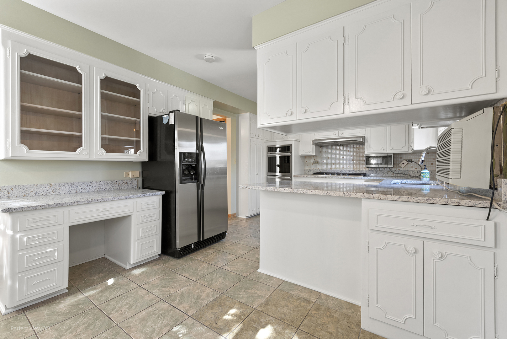 1121 North Northwest Highway Park Ridge, IL 60068 - Photo 5 of 26 a kitchen with stainless steel appliances granite countertop a refrigerator a stove a sink and dishwasher a oven with white cabinets