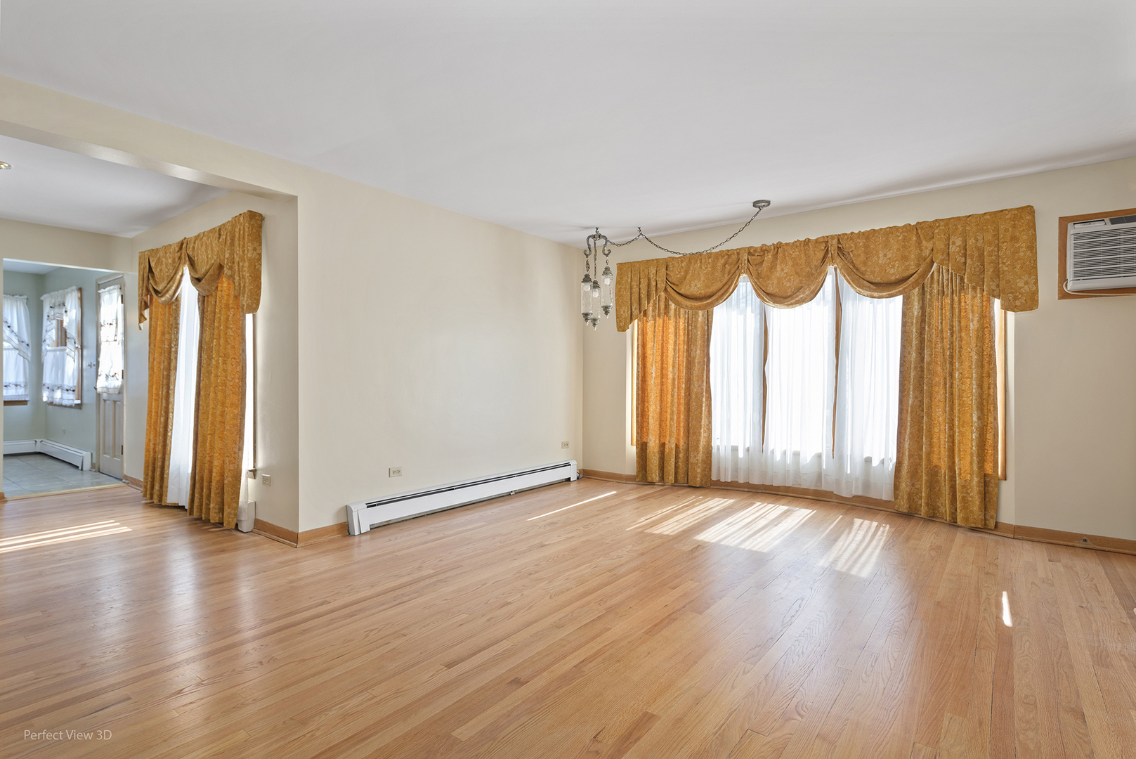 1121 North Northwest Highway Park Ridge, IL 60068 - Photo 7 of 26 a view of a room with wooden floor and a window