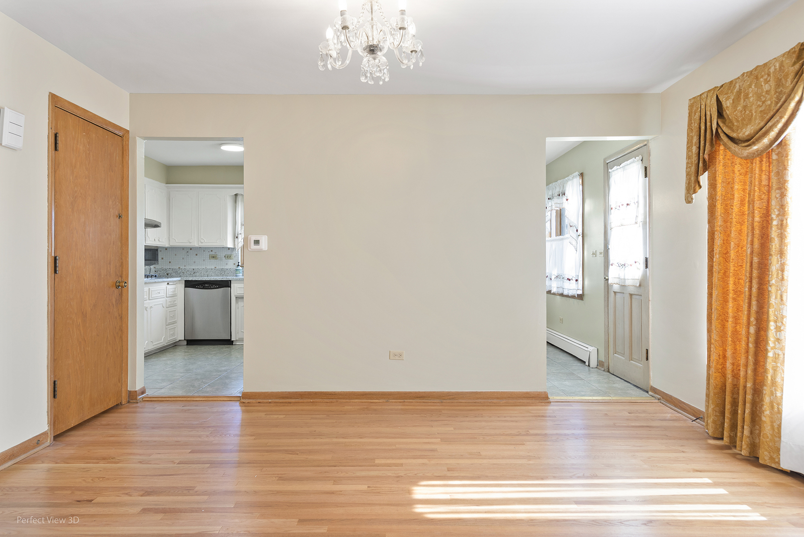 1121 North Northwest Highway Park Ridge, IL 60068 - Photo 9 of 26 a view of a big room with wooden floor and windows