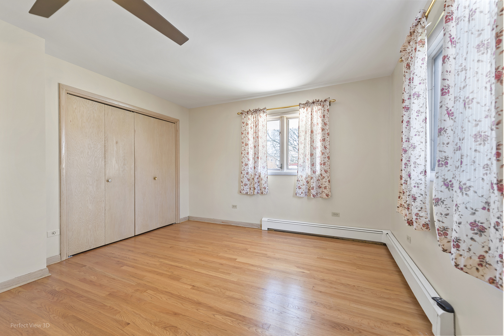 1121 North Northwest Highway Park Ridge, IL 60068 - Photo 10 of 26 an empty room with wooden floor and windows