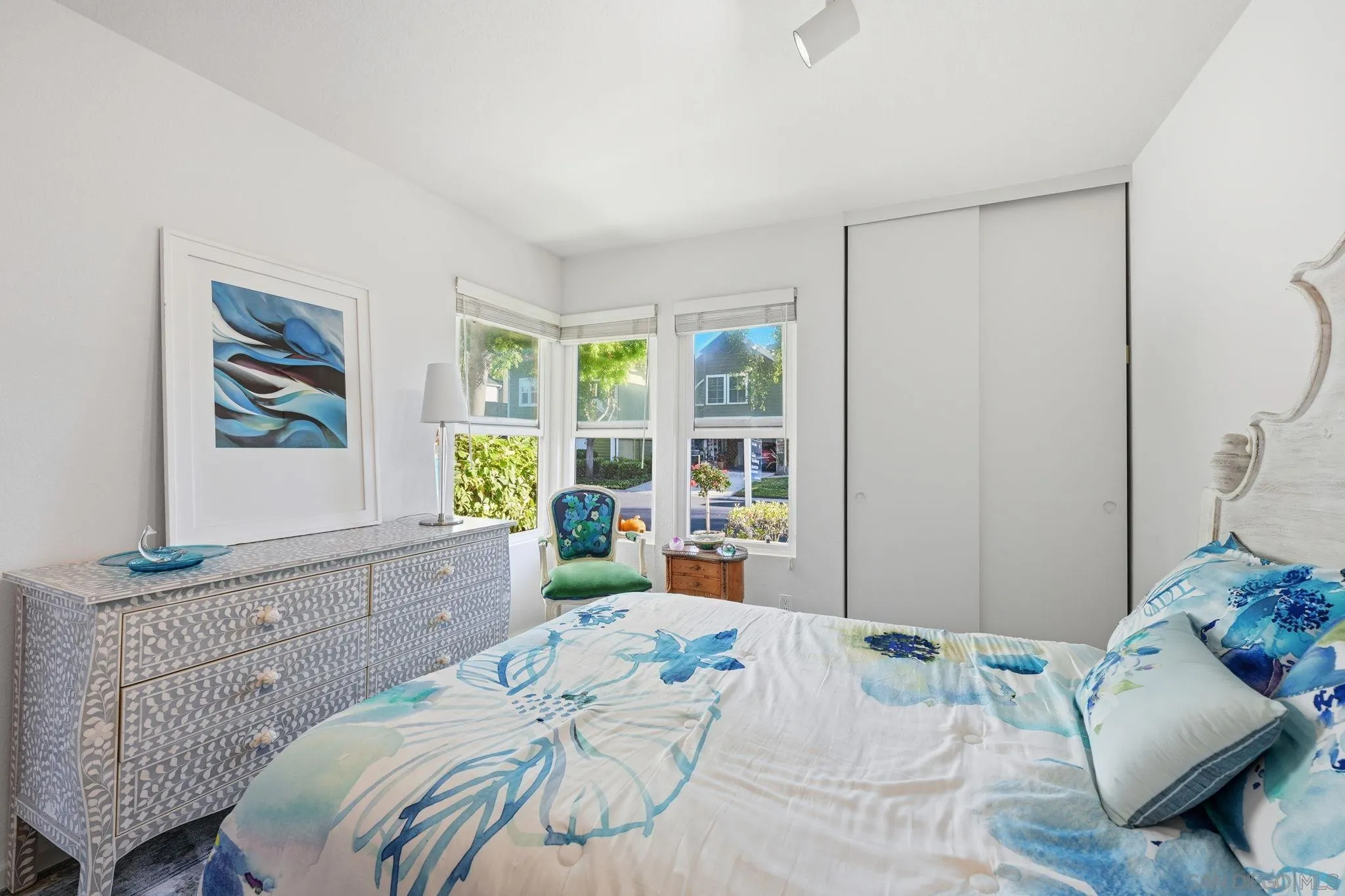 3626 Lorimer Lane Encinitas, CA 92024 - Photo 27 of 62 a bedroom with a bed and wooden floor