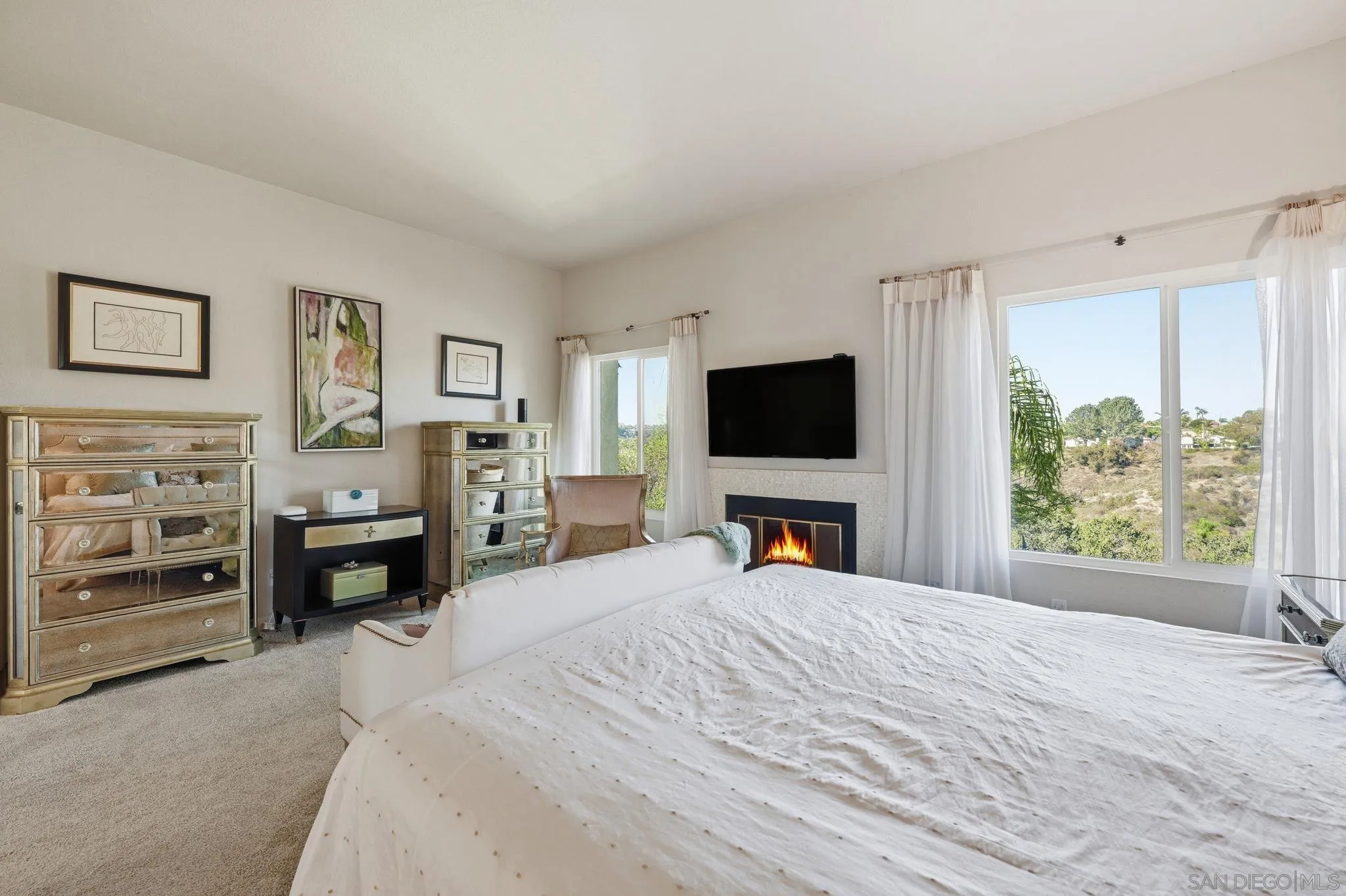 3626 Lorimer Lane Encinitas, CA 92024 - Photo 29 of 62 a bedroom with a bed and a flat screen tv
