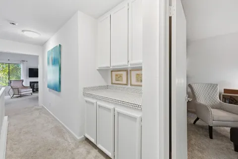 a table and chairs with the view of back yard