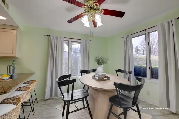 a kitchen with a sink stainless steel appliances and cabinets