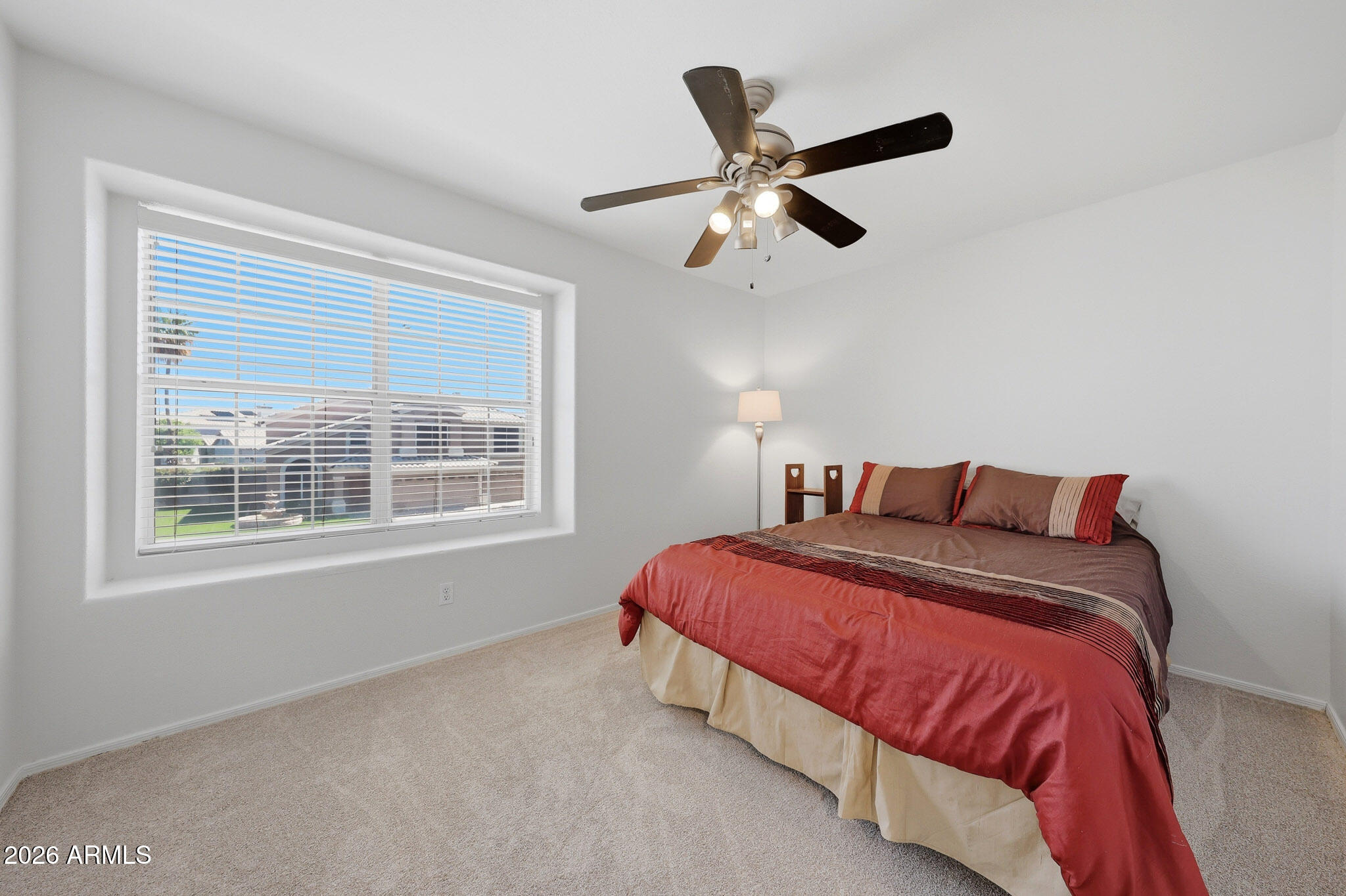 648 South Cholla Street Gilbert, AZ 85233 - Photo 27 of 46 a bedroom with a large bed and a window