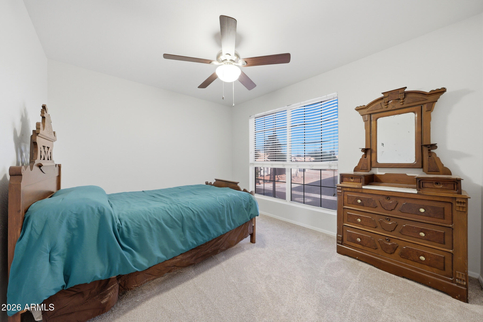 648 South Cholla Street Gilbert, AZ 85233 - Photo 29 of 46 a living room with a bed and furniture