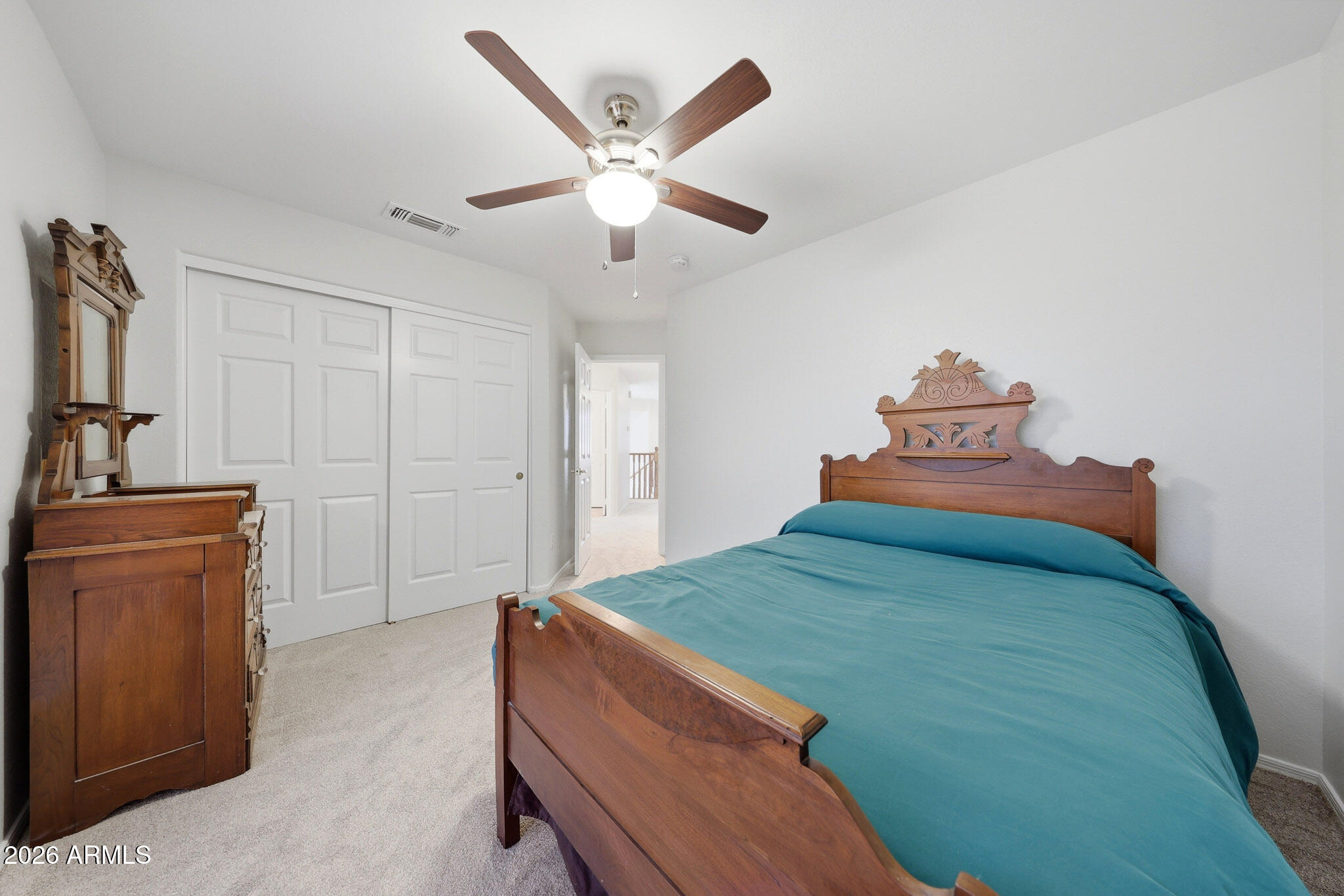 648 South Cholla Street Gilbert, AZ 85233 - Photo 30 of 46 a bedroom with a bed and wooden floor