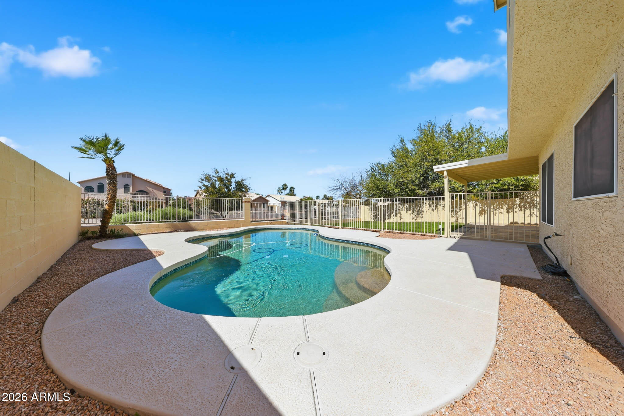 648 South Cholla Street Gilbert, AZ 85233 - Photo 41 of 46 a view of outdoor space and swimming pool