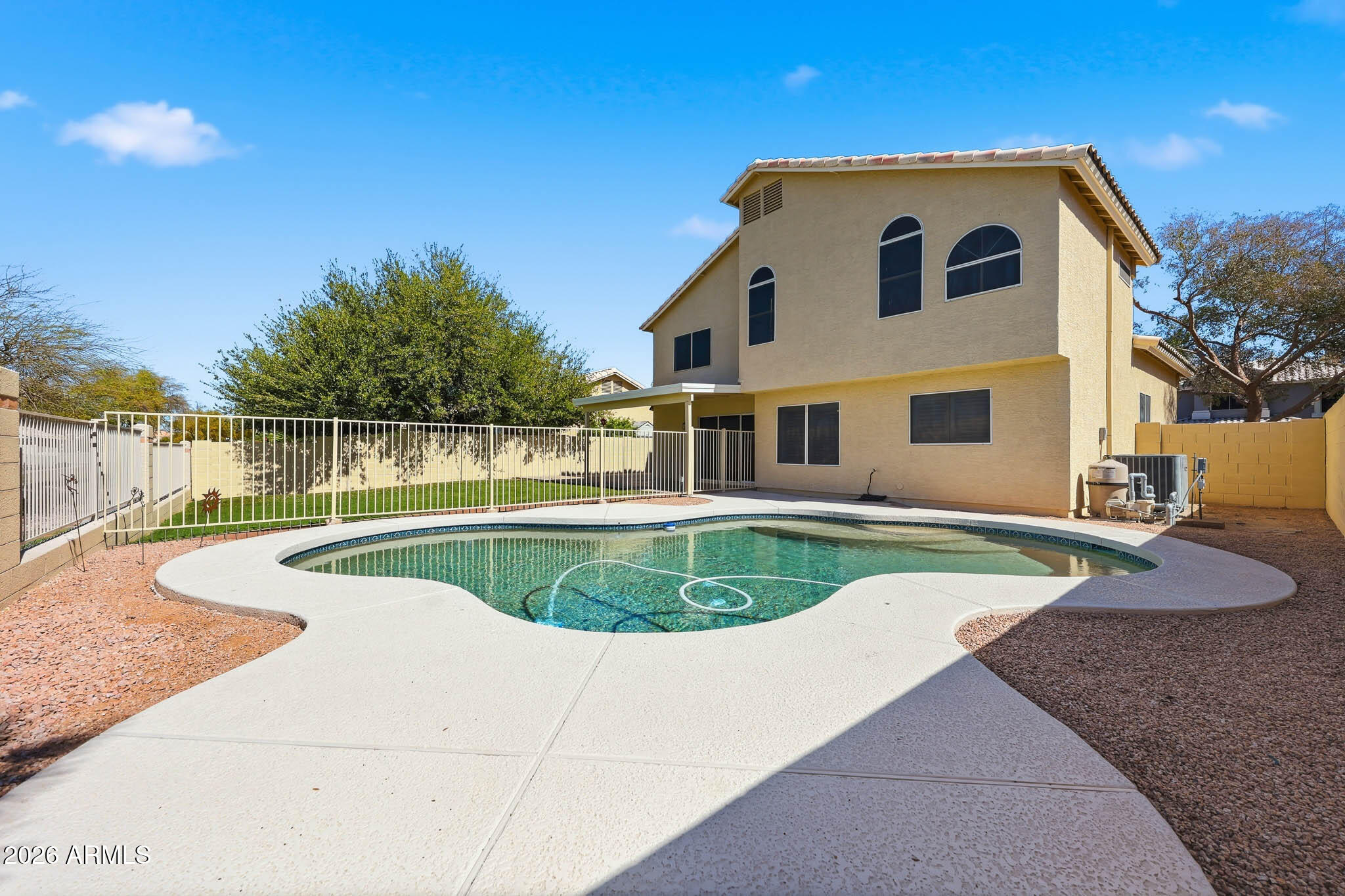 648 South Cholla Street Gilbert, AZ 85233 - Photo 42 of 46 a view of outdoor space yard swimming pool and outdoor