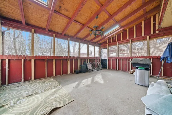 a view of a porch with furniture