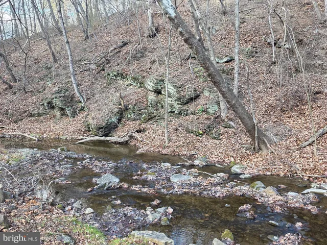a view of water covered with snow